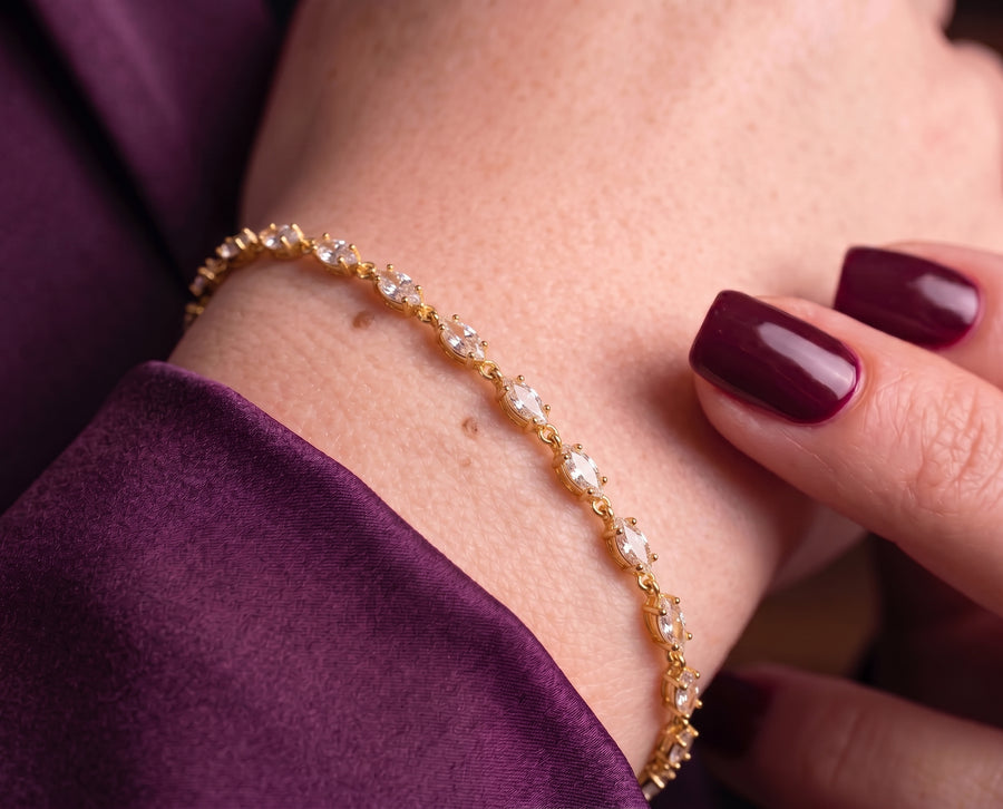 Marquise-cut cubic zirconia bracelet worn on a wrist, close-up