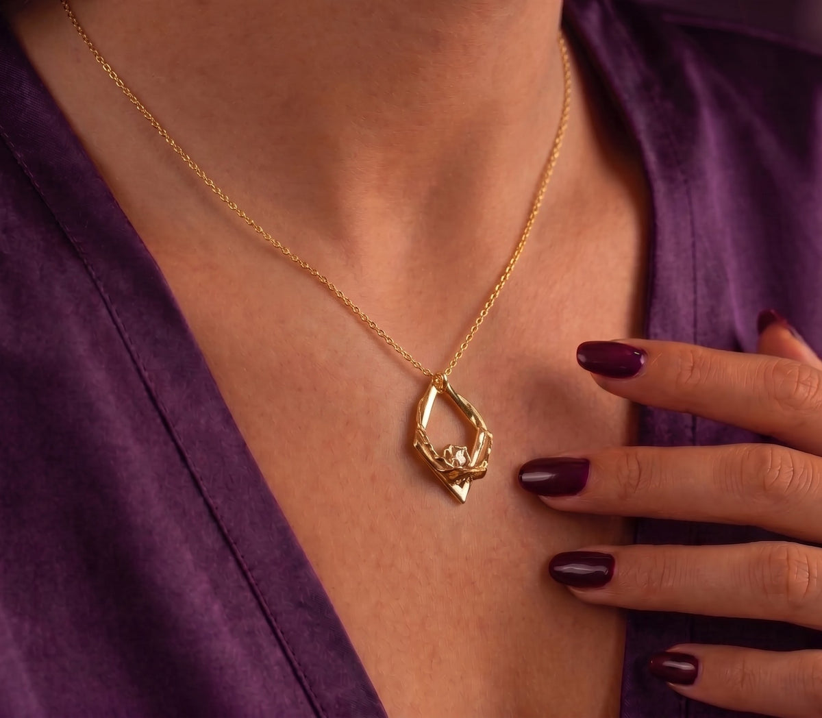 Ring holder necklace worn with a ring held on the pendant