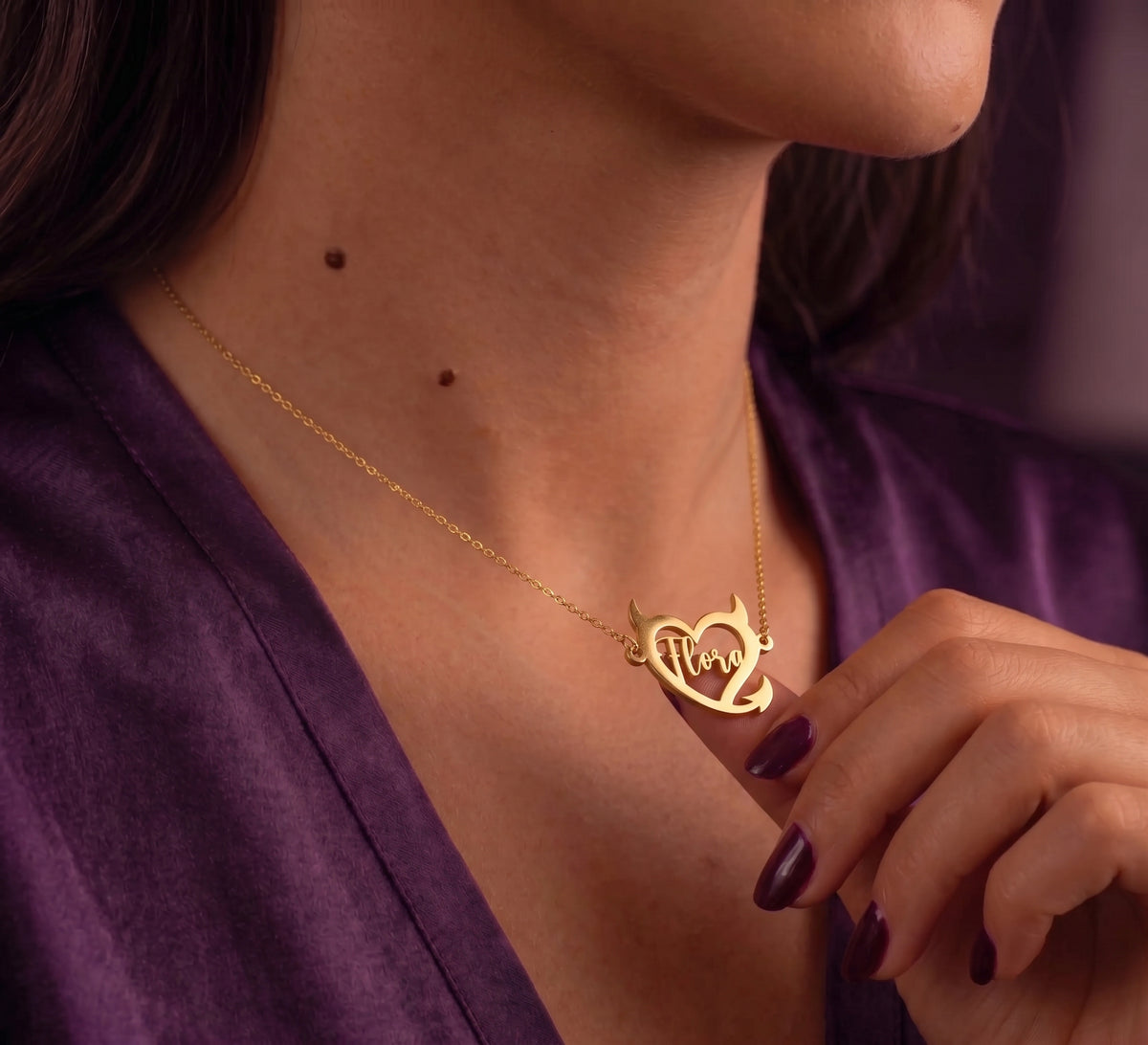 Devil heart name necklace worn, side view