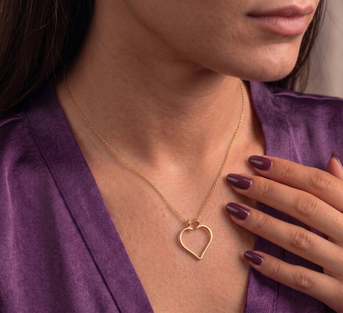 Heart ring holder necklace worn on the chest