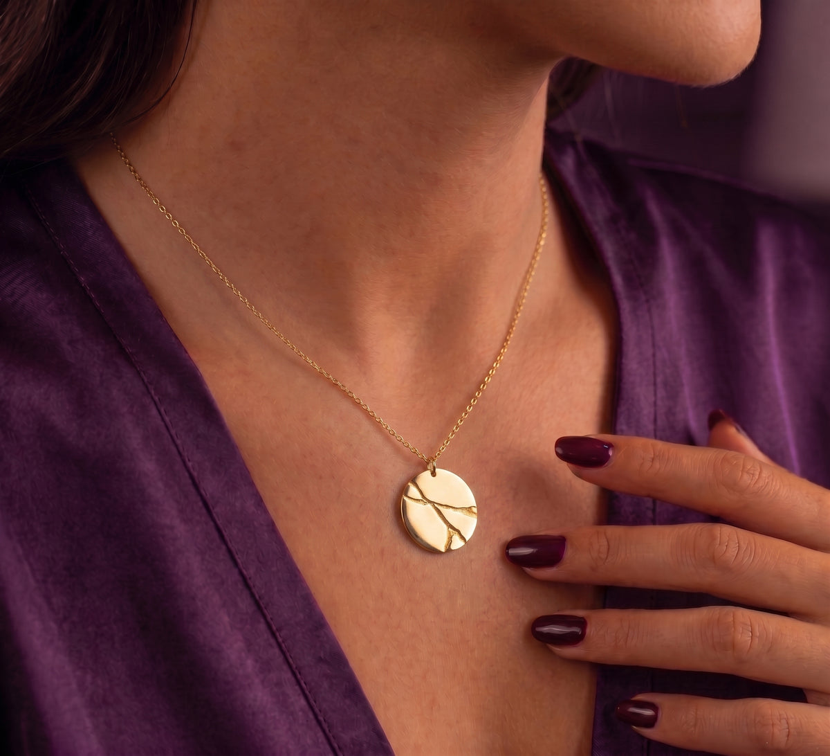 Kintsugi disc necklace worn, side view