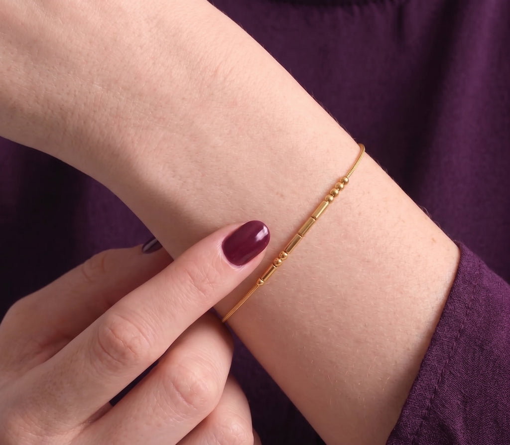 Morse code bracelet worn on the wrist