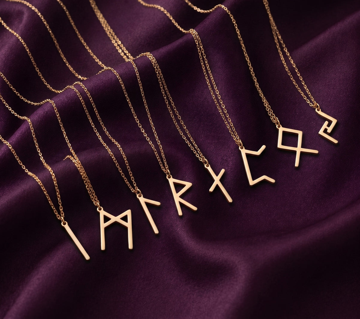Row of necklaces with different rune pendants