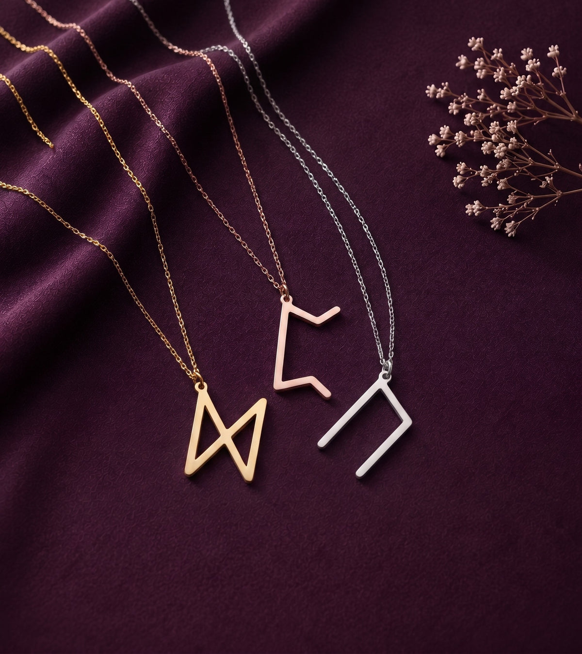 Three rune necklaces in different tones