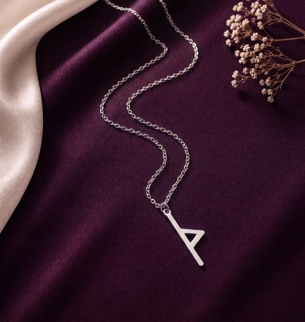 Silver tone rune necklace with cream satin and dried flowers